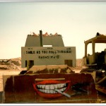 Louisiana National Guard Soldiers from the 527th Engineer Battalion relax on the top of their armor-plated D7F Dozers