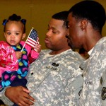 LAPLACE, La. – Soldiers of the Louisiana National Guard’s 1084th Transportation Company bid farewell to family and friends during a deployment ceremony at The St. John Center in LaPlace, La., Feb. 24, 2013. The 1084th will deploy more than 155 Soldiers during a 365-day deployment to Afghanistan to utilize their expertise and versatility by providing convoy escort of host-nation vehicles and provide transportation support to friendly forces operating within the assigned area. (National Guard photo by Sgt. Rashawn D. Price, 241st Mobile Public Affairs Detachment)