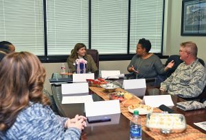 Mrs. Cherie Spooner, Louisiana Air National Guard Airman and Family Readiness Program Manager, speaks to Mrs. Nancy Rice about the LA ANG’s “Front Porch” concept during a Wing visit at Naval Air Station Joint Reserve Base New Orleans, Nov. 2, 2019. The LA ANG Front Porch concept incorporates several Airman and Family assistance programs from various offices such as; Family Readiness, Psychological Health, Chaplain, Yellow Ribbon and SAPR. (U.S. Air National Guard photo by Master Sgt. Toby Valadie)