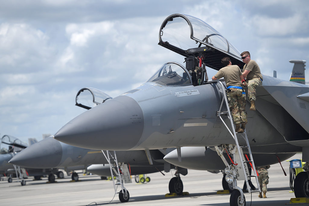 159th Maintenance Group crew chiefs inspect an F-15C in preparation for takeoff at the Air Dominance Center in Savannah, Ga., June 9, 2021. Six Louisiana Air National Guard F-15s deployed to the ADC to participate in dissimilar aircraft training which allows pilots to hone their tactical skills with other combat airframes. (U.S. Air National Guard photo by Senior Master Sgt. Daniel Farrell)