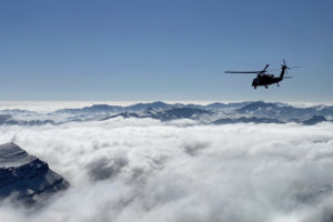 Soldiers from G Company 2-238th General Support Aviation Battalion, as part of Task Force Dragon while deployed to Afghanistan, conduct flight training in Afghanistan, Jan. 16, 2020. The training was done to comply with Army aviation regulations regarding rated and non-rated crewmember requirements. (U.S. Army National Guard courtesy photo)