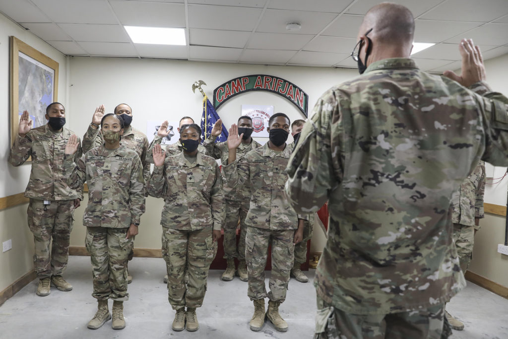 Brig. Gen. Keith Waddell, the adjutant general of the Louisiana National Guard, administers the oath of enlistment for Soldiers of the 527th Engineer Battalion, who are currently deployed to Kuwait in support of U.S. Central Command. (U.S. Army National Guard photo by Staff Sgt. Noshoba Davis)