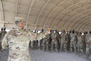 Command Sgt. Maj. Clifford Ockman, the senior enlisted advisor of the Louisiana National Guard, speaks to Soldiers of the 239th Military Police Company about what to expect while deployed in support of U.S. Central Command, and how to make the most of the deployment. (U.S. Army National Guard photo by Staff Sgt. Noshoba Davis)