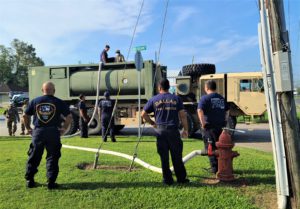 Soldiers of A Company, 199th Brigade Support Battalion, 256th Infantry Brigade Combat Team, delivered bulk water and conducted water treatment tests in Chauvin, Louisiana, on Sept. 9, 2021, in support of Hurricane Ida relief efforts. The delivered water is chemically treated and tested to ensure its potability for consumption and household use. (U.S. Army National Guard photo by Cadet Cody Kellum)