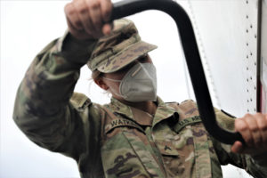 Cpl. Sarah Watkins, an Ohio Army National Guard motor transport operator with the 1483rd Transportation Company, 112th Transportation Battalion, from Walbridge, Oh., unhooks a trailer from her truck until her next delivery mission in support of Hurricane Ida, Schriever, Louisiana, Sept 17, 2021. (U.S. Army National Guard photo by Staff Sgt. Gregory Stevens)