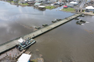 Louisiana National Guard engineer work teams assigned to the 2225th Multi-Role Bridge Company, 225th Engineer Brigade completed the massive build of a 24-Bay Improved Ribbon Bridge (IBR), Jean Lafitte, La., Sept. 5, 2021. During Hurricane Ida’s initial impact, the only bridge leading into the community of Barrataria was destroyed due to the strong storm surge. (U.S. Army National Guard photo by 1st Lt. Steven McCoppin)