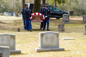 A Louisiana National Guard Military Funeral Honors Team escorts a fallen soldier during his internment ceremony, March 13, 2021. Over the last year alone, the team proudly rendered honors at more than 1,500 veterans’ funerals, honoring them for their service. (U.S. Army National Guard photo by Sgt. 1st Class Denis Ricou)